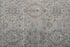 7' X 10' Silver Taupe and Blue Oriental Power Loom Worn Faded Area Rug With Fringe
